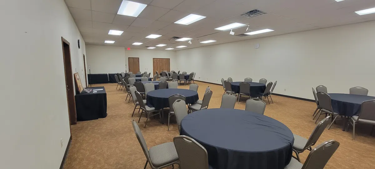 Another view of the Grand Room showing the room depth and serving table along the wall